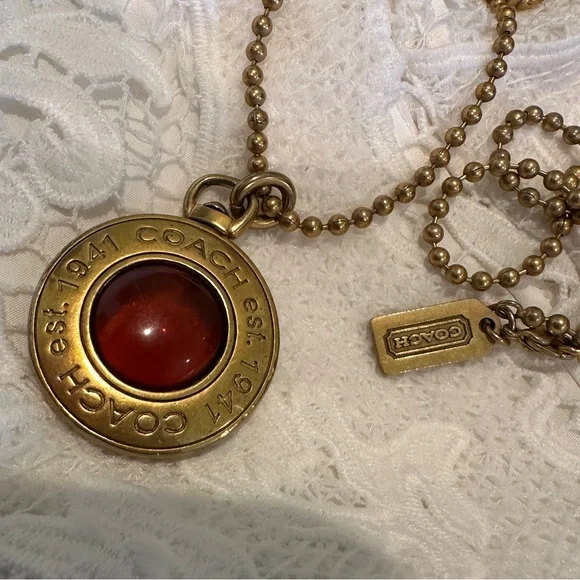 Coach Logo Pendant In Gold Tone with Amber Glass Center on Gold Tone Chain - Picture 6 of 16